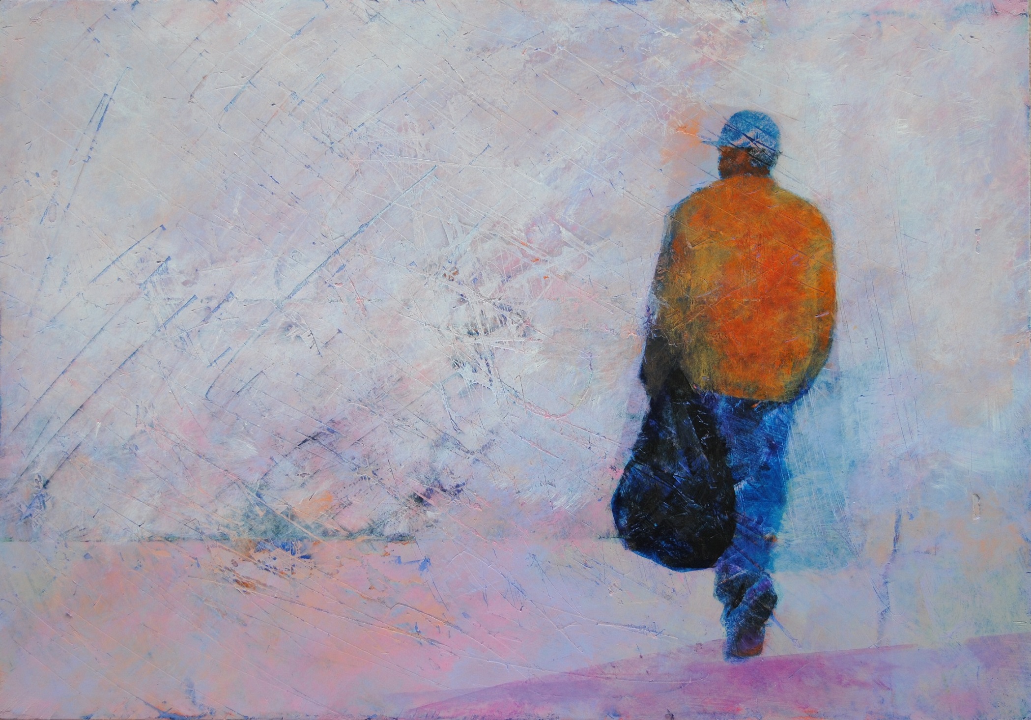 A man walking with a trash bag